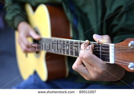 stock-photo-play-acoustic-guitar-89511007.jpg