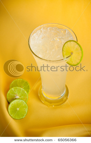 stock-photo-lemonade-on-yellow-background-65056366.jpg