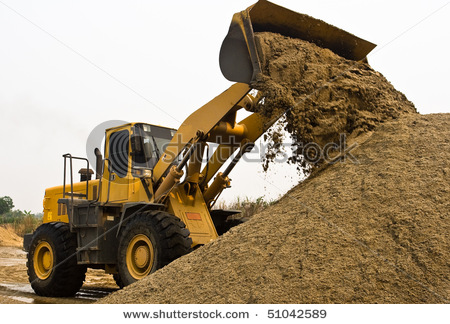 stock-photo-a-wheel-loader-s-working-in-a-construction-area-51042589.jpg