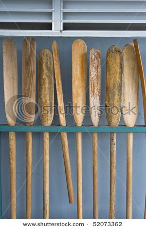 stock-photo-old-wooden-oars-in-storeroom-52073362.jpg