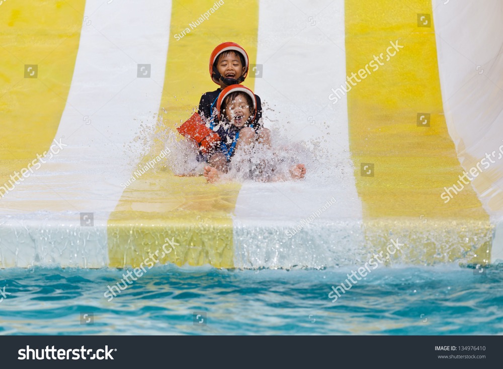 stock photo asian boy playing in water park 134976410
