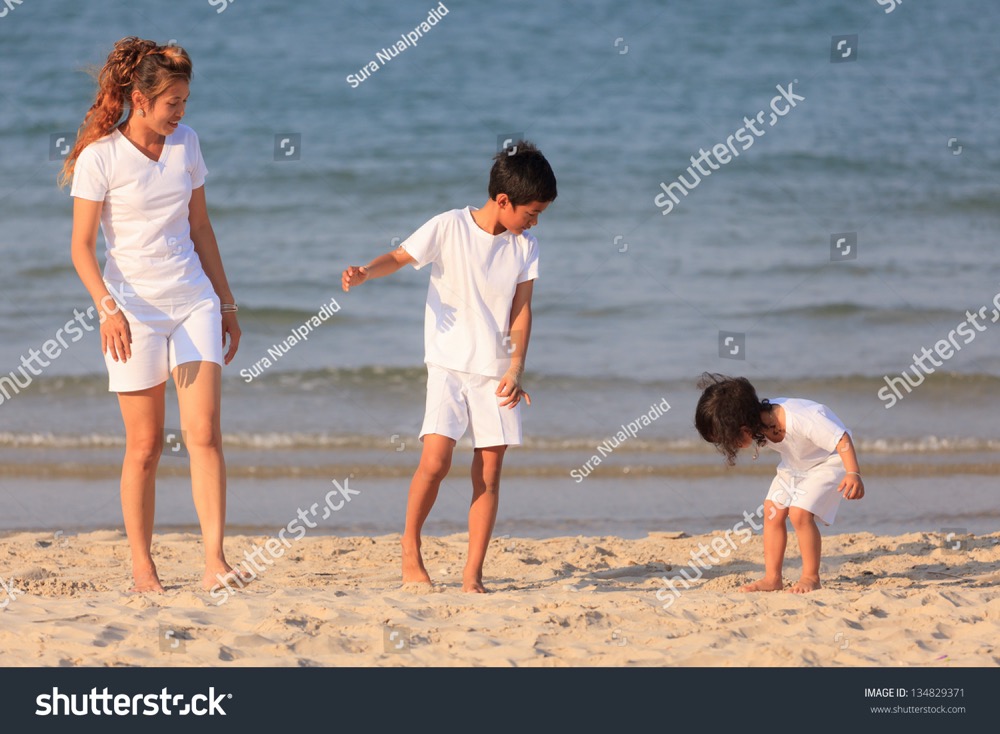 stock photo asian family play on tropical beach 134829371